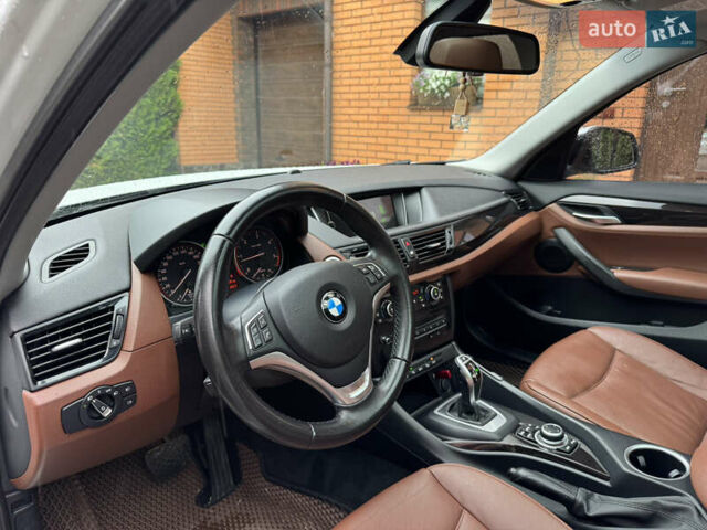 Білий БМВ Х1, об'ємом двигуна 2 л та пробігом 235 тис. км за 15100 $, фото 34 на Automoto.ua