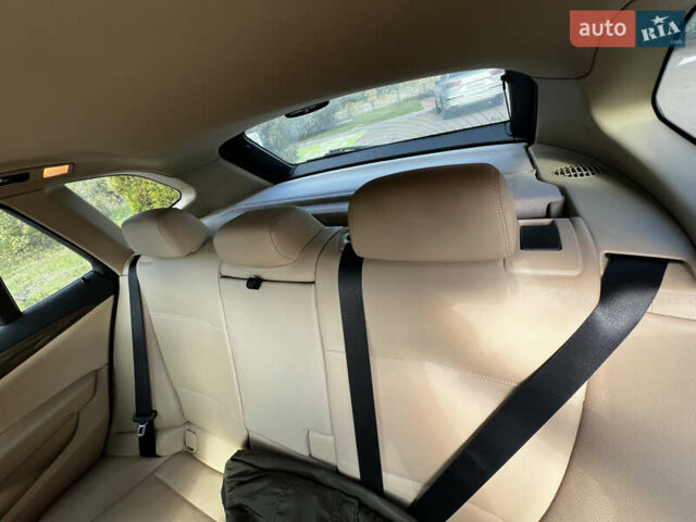 Білий БМВ Х1, об'ємом двигуна 2 л та пробігом 203 тис. км за 13100 $, фото 5 на Automoto.ua