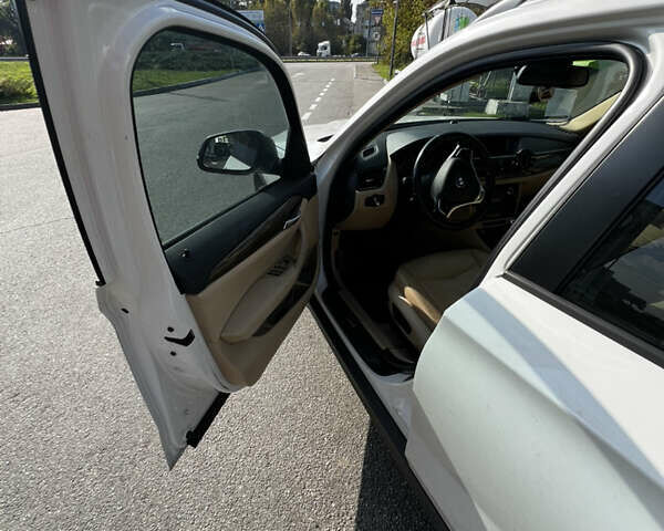 Білий БМВ Х1, об'ємом двигуна 2 л та пробігом 203 тис. км за 13100 $, фото 11 на Automoto.ua