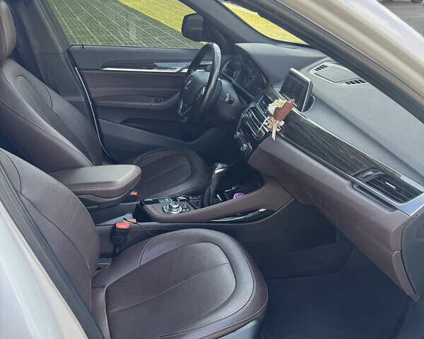 Білий БМВ Х1, об'ємом двигуна 2 л та пробігом 158 тис. км за 16999 $, фото 13 на Automoto.ua