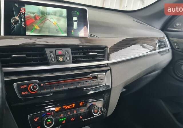 Білий БМВ Х1, об'ємом двигуна 2 л та пробігом 156 тис. км за 14999 $, фото 6 на Automoto.ua