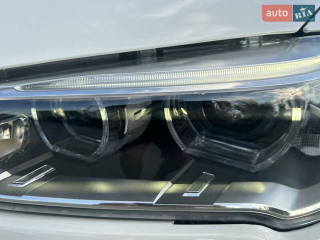 Білий БМВ Х1, об'ємом двигуна 2 л та пробігом 150 тис. км за 21800 $, фото 24 на Automoto.ua