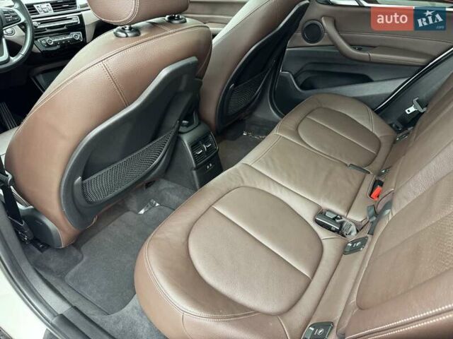 Білий БМВ Х1, об'ємом двигуна 2 л та пробігом 76 тис. км за 18300 $, фото 28 на Automoto.ua