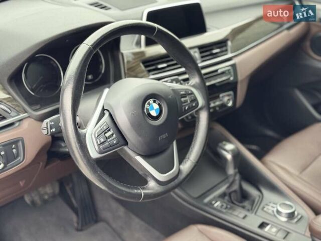 Білий БМВ Х1, об'ємом двигуна 2 л та пробігом 76 тис. км за 18300 $, фото 14 на Automoto.ua