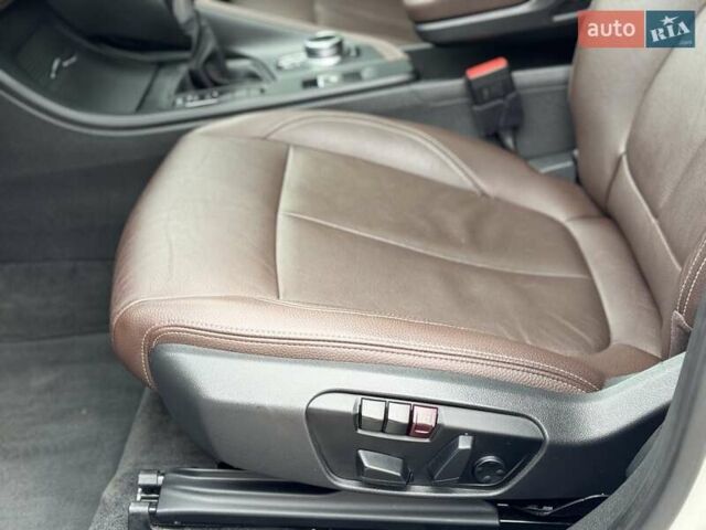 Білий БМВ Х1, об'ємом двигуна 2 л та пробігом 76 тис. км за 18300 $, фото 16 на Automoto.ua