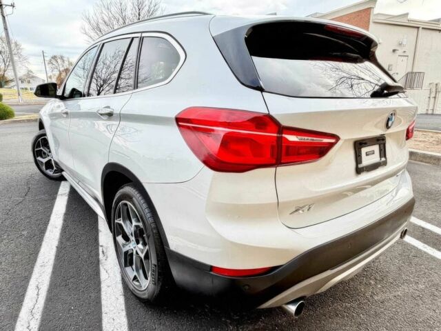 Белый БМВ Х1, объемом двигателя 2 л и пробегом 49 тыс. км за 10000 $, фото 3 на Automoto.ua