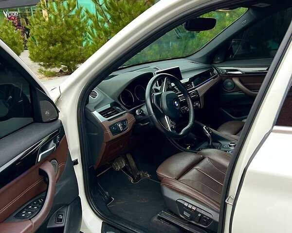 Белый БМВ Х1, объемом двигателя 2 л и пробегом 142 тыс. км за 23000 $, фото 6 на Automoto.ua
