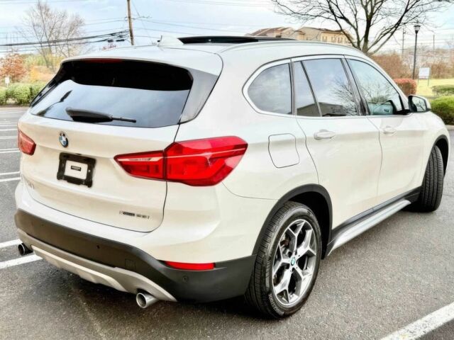 Белый БМВ Х1, объемом двигателя 2 л и пробегом 49 тыс. км за 10000 $, фото 5 на Automoto.ua