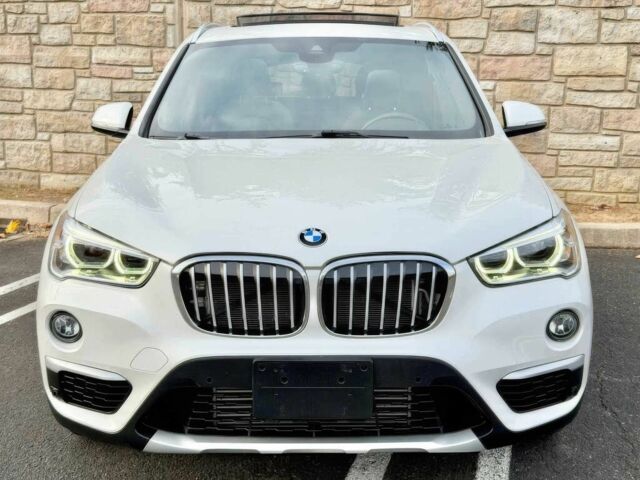 Белый БМВ Х1, объемом двигателя 2 л и пробегом 49 тыс. км за 10000 $, фото 1 на Automoto.ua