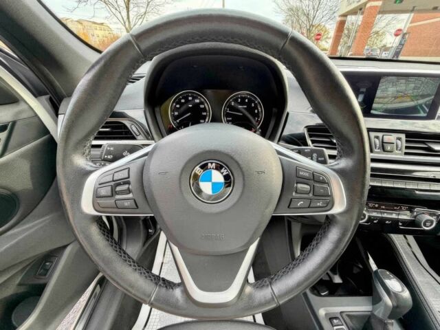 Белый БМВ Х1, объемом двигателя 2 л и пробегом 49 тыс. км за 10000 $, фото 11 на Automoto.ua