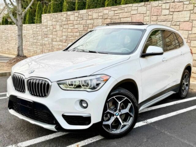 Белый БМВ Х1, объемом двигателя 2 л и пробегом 49 тыс. км за 10000 $, фото 2 на Automoto.ua