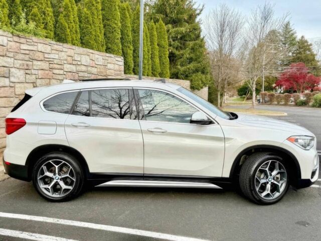 Белый БМВ Х1, объемом двигателя 2 л и пробегом 49 тыс. км за 10000 $, фото 6 на Automoto.ua