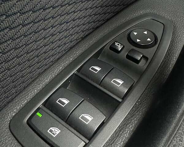 Білий БМВ Х1, об'ємом двигуна 2 л та пробігом 106 тис. км за 30600 $, фото 45 на Automoto.ua