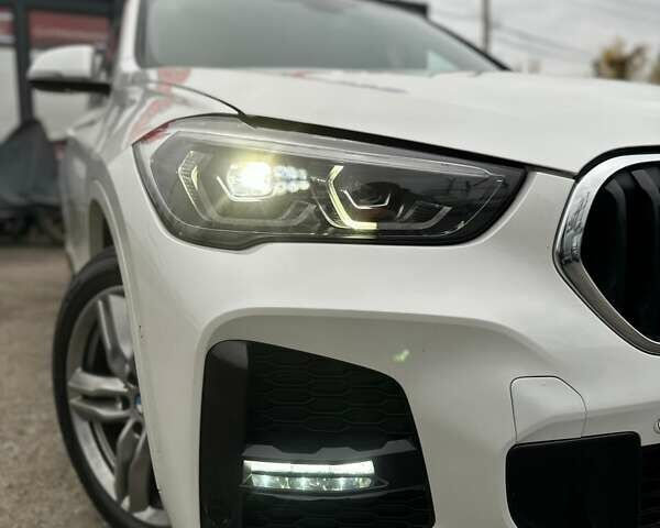 Білий БМВ Х1, об'ємом двигуна 2 л та пробігом 106 тис. км за 30600 $, фото 2 на Automoto.ua