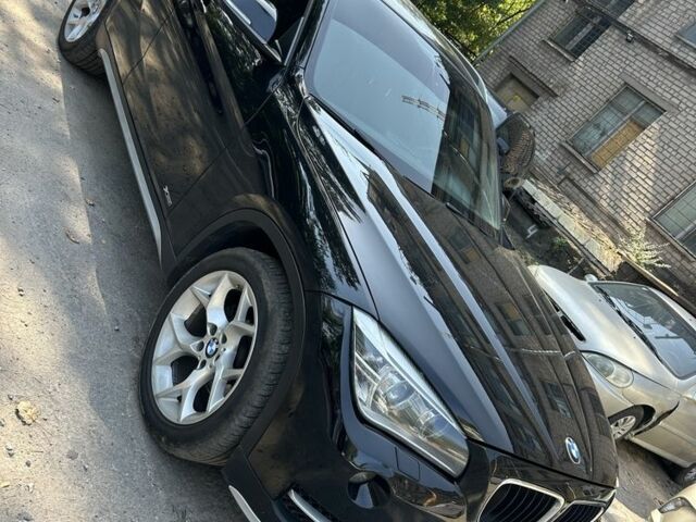 Чорний БМВ Х1, об'ємом двигуна 2 л та пробігом 230 тис. км за 12467 $, фото 1 на Automoto.ua