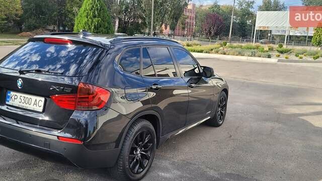 Чорний БМВ Х1, об'ємом двигуна 2 л та пробігом 215 тис. км за 13500 $, фото 2 на Automoto.ua