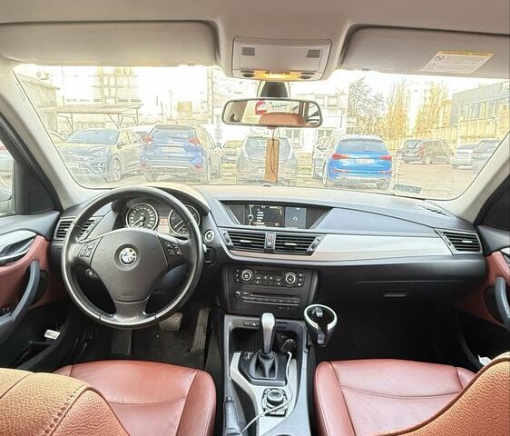 Черный БМВ Х1, объемом двигателя 2 л и пробегом 300 тыс. км за 8750 $, фото 3 на Automoto.ua