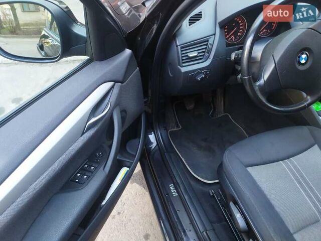 Черный БМВ Х1, объемом двигателя 2 л и пробегом 230 тыс. км за 10000 $, фото 1 на Automoto.ua