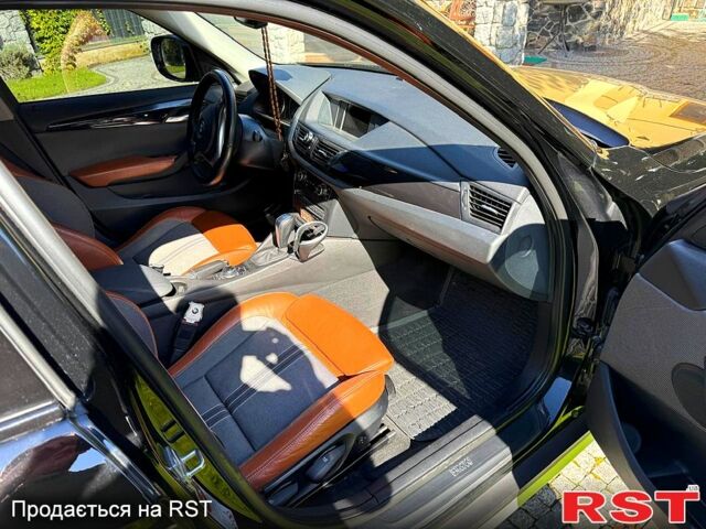 Чорний БМВ Х1, об'ємом двигуна 2 л та пробігом 300 тис. км за 12500 $, фото 1 на Automoto.ua