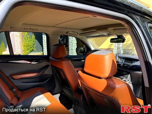 Чорний БМВ Х1, об'ємом двигуна 2 л та пробігом 300 тис. км за 12500 $, фото 2 на Automoto.ua