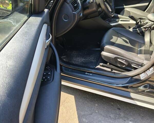 Черный БМВ Х1, объемом двигателя 2 л и пробегом 224 тыс. км за 13650 $, фото 5 на Automoto.ua