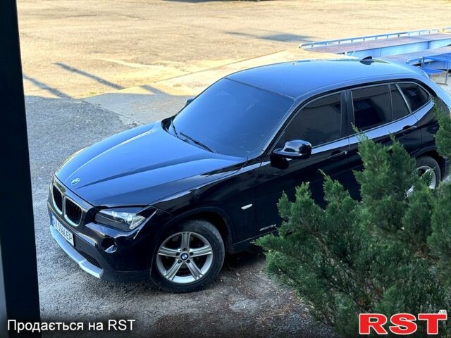 Чорний БМВ Х1, об'ємом двигуна 2 л та пробігом 305 тис. км за 9000 $, фото 1 на Automoto.ua