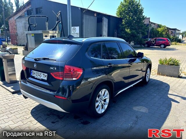 Чорний БМВ Х1, об'ємом двигуна 2 л та пробігом 205 тис. км за 12500 $, фото 1 на Automoto.ua