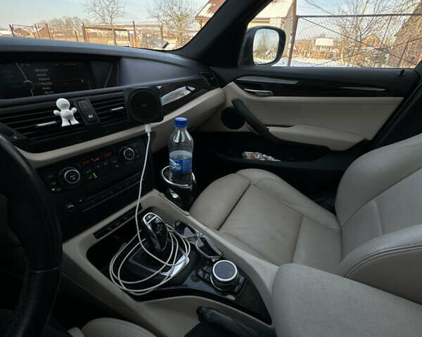 Чорний БМВ Х1, об'ємом двигуна 2 л та пробігом 138 тис. км за 11000 $, фото 7 на Automoto.ua