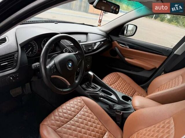 Чорний БМВ Х1, об'ємом двигуна 2 л та пробігом 114 тис. км за 11999 $, фото 5 на Automoto.ua