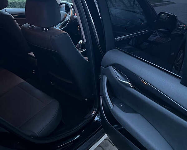 Чорний БМВ Х1, об'ємом двигуна 2 л та пробігом 173 тис. км за 12300 $, фото 27 на Automoto.ua