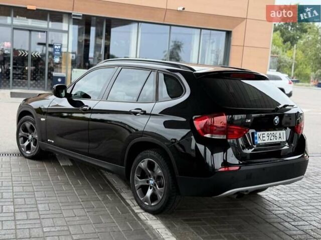 Чорний БМВ Х1, об'ємом двигуна 2 л та пробігом 114 тис. км за 11999 $, фото 2 на Automoto.ua