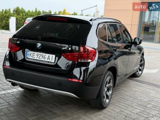 Чорний БМВ Х1, об'ємом двигуна 2 л та пробігом 114 тис. км за 11999 $, фото 4 на Automoto.ua