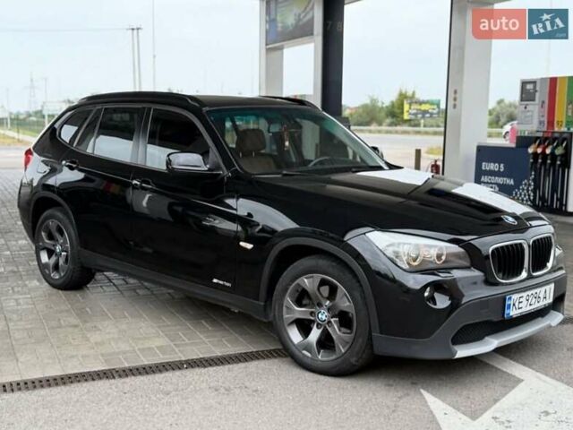 Чорний БМВ Х1, об'ємом двигуна 2 л та пробігом 114 тис. км за 11999 $, фото 1 на Automoto.ua