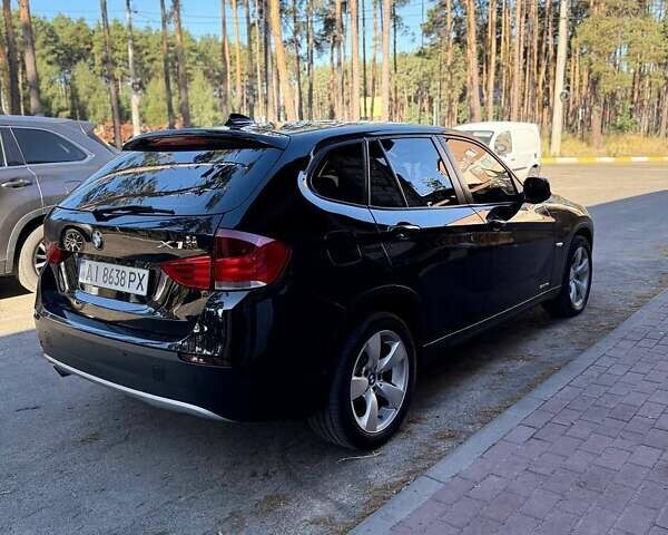 Черный БМВ Х1, объемом двигателя 2 л и пробегом 315 тыс. км за 9999 $, фото 1 на Automoto.ua