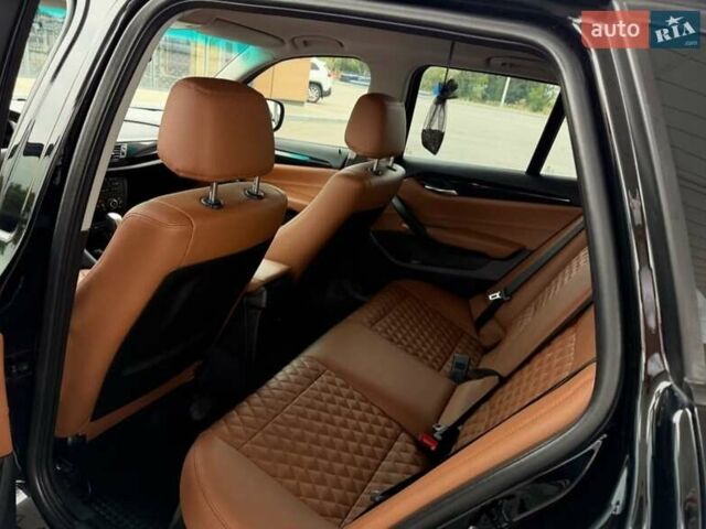 Чорний БМВ Х1, об'ємом двигуна 2 л та пробігом 114 тис. км за 11999 $, фото 3 на Automoto.ua