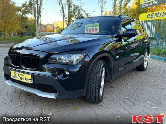 Чорний БМВ Х1, об'ємом двигуна 2 л та пробігом 183 тис. км за 13800 $, фото 1 на Automoto.ua