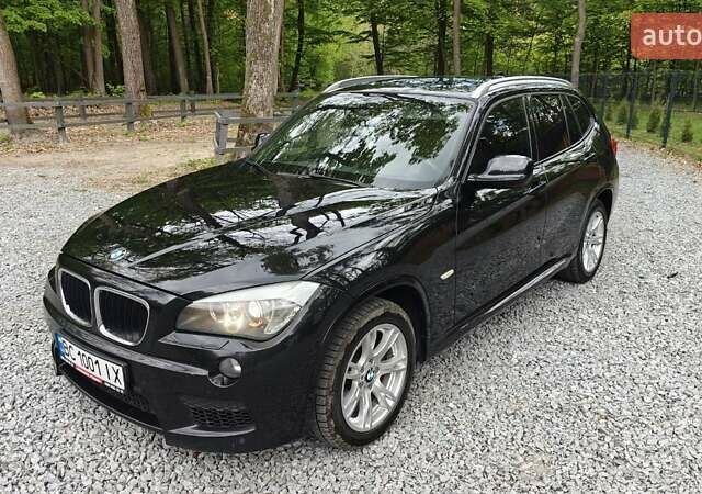 Черный БМВ Х1, объемом двигателя 2 л и пробегом 284 тыс. км за 11999 $, фото 1 на Automoto.ua