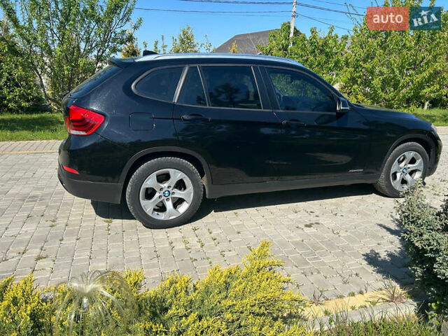 Черный БМВ Х1, объемом двигателя 2 л и пробегом 127 тыс. км за 11000 $, фото 1 на Automoto.ua