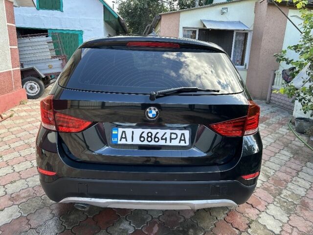 Черный БМВ Х1, объемом двигателя 2 л и пробегом 270 тыс. км за 9700 $, фото 2 на Automoto.ua