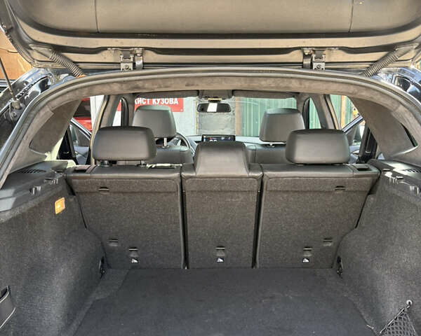 Черный БМВ Х1, объемом двигателя 2 л и пробегом 124 тыс. км за 10500 $, фото 16 на Automoto.ua