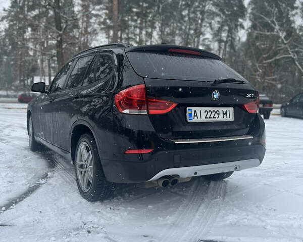 Черный БМВ Х1, объемом двигателя 2 л и пробегом 175 тыс. км за 9400 $, фото 3 на Automoto.ua