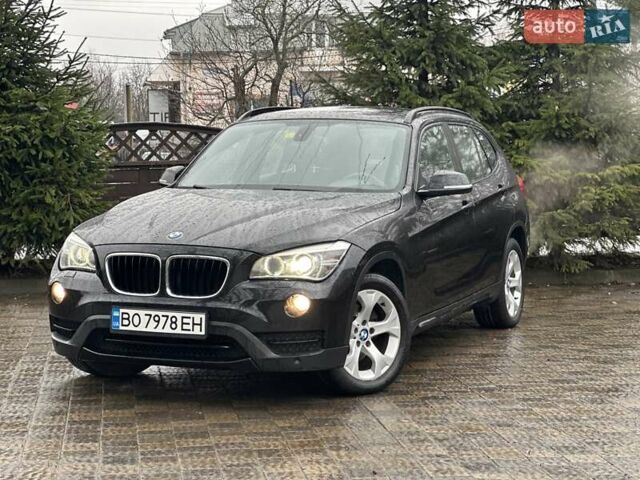 Черный БМВ Х1, объемом двигателя 2 л и пробегом 208 тыс. км за 14499 $, фото 1 на Automoto.ua