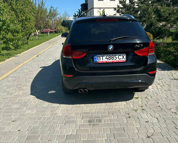 Чорний БМВ Х1, об'ємом двигуна 2 л та пробігом 122 тис. км за 12999 $, фото 2 на Automoto.ua