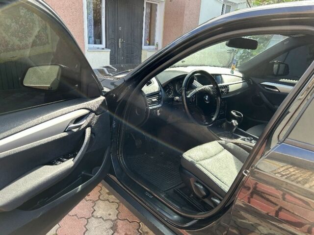 Черный БМВ Х1, объемом двигателя 2 л и пробегом 270 тыс. км за 9700 $, фото 7 на Automoto.ua