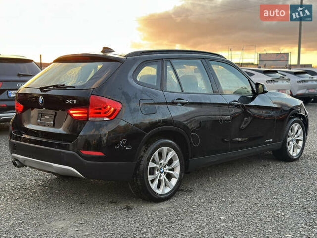 Чорний БМВ Х1, об'ємом двигуна 2 л та пробігом 126 тис. км за 9000 $, фото 4 на Automoto.ua