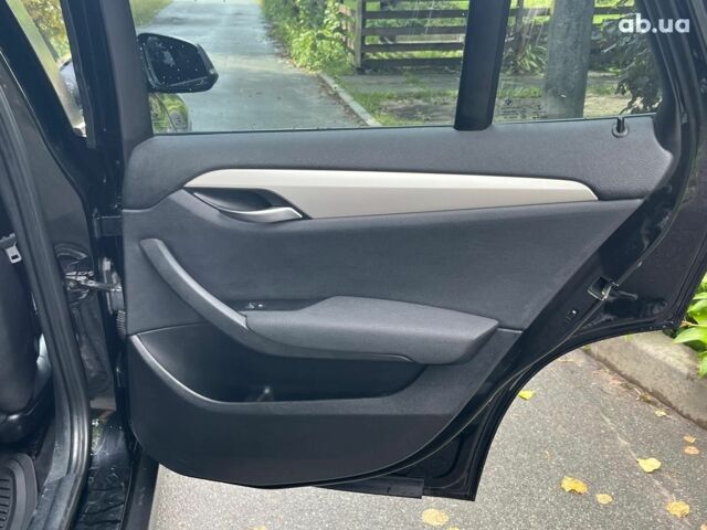 Чорний БМВ Х1, об'ємом двигуна 2 л та пробігом 345 тис. км за 11490 $, фото 14 на Automoto.ua