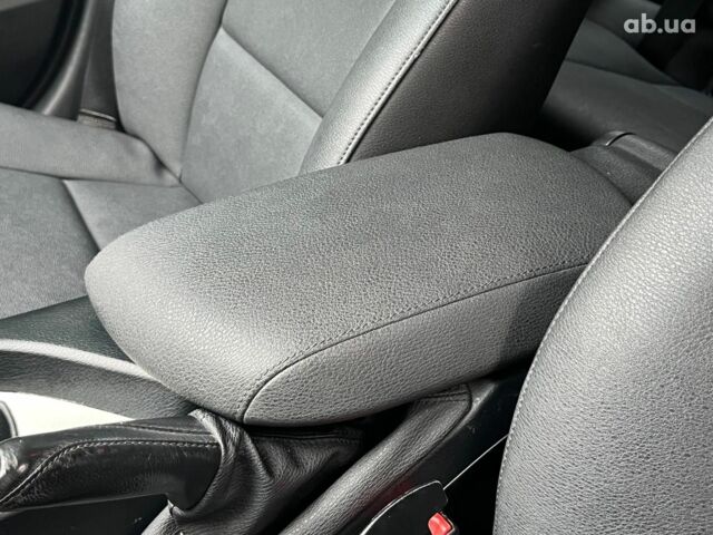 Чорний БМВ Х1, об'ємом двигуна 2 л та пробігом 345 тис. км за 11490 $, фото 26 на Automoto.ua