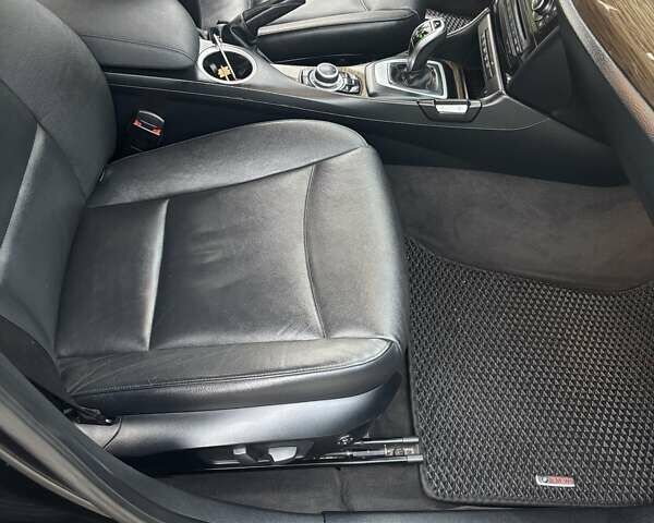 Чорний БМВ Х1, об'ємом двигуна 2 л та пробігом 155 тис. км за 12200 $, фото 14 на Automoto.ua