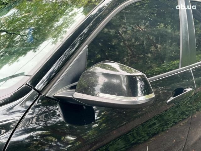 Чорний БМВ Х1, об'ємом двигуна 2 л та пробігом 345 тис. км за 11490 $, фото 12 на Automoto.ua