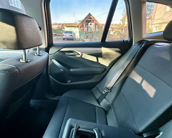 Чорний БМВ Х1, об'ємом двигуна 2 л та пробігом 201 тис. км за 12000 $, фото 52 на Automoto.ua